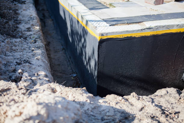 Professional Basement Waterproofing technician working in Sharps Chapel, TN